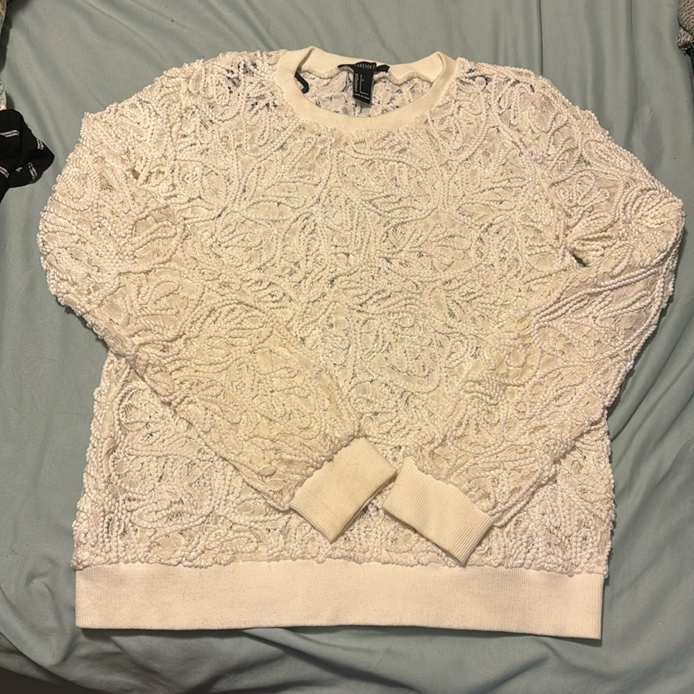 Cute white sweater!